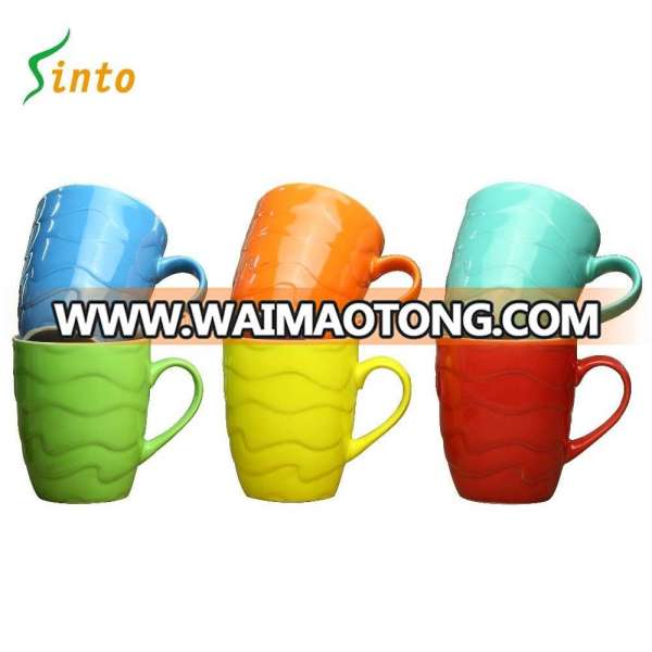 wholesale cheap bulk color glazed porcelain custom embossed coffee mug